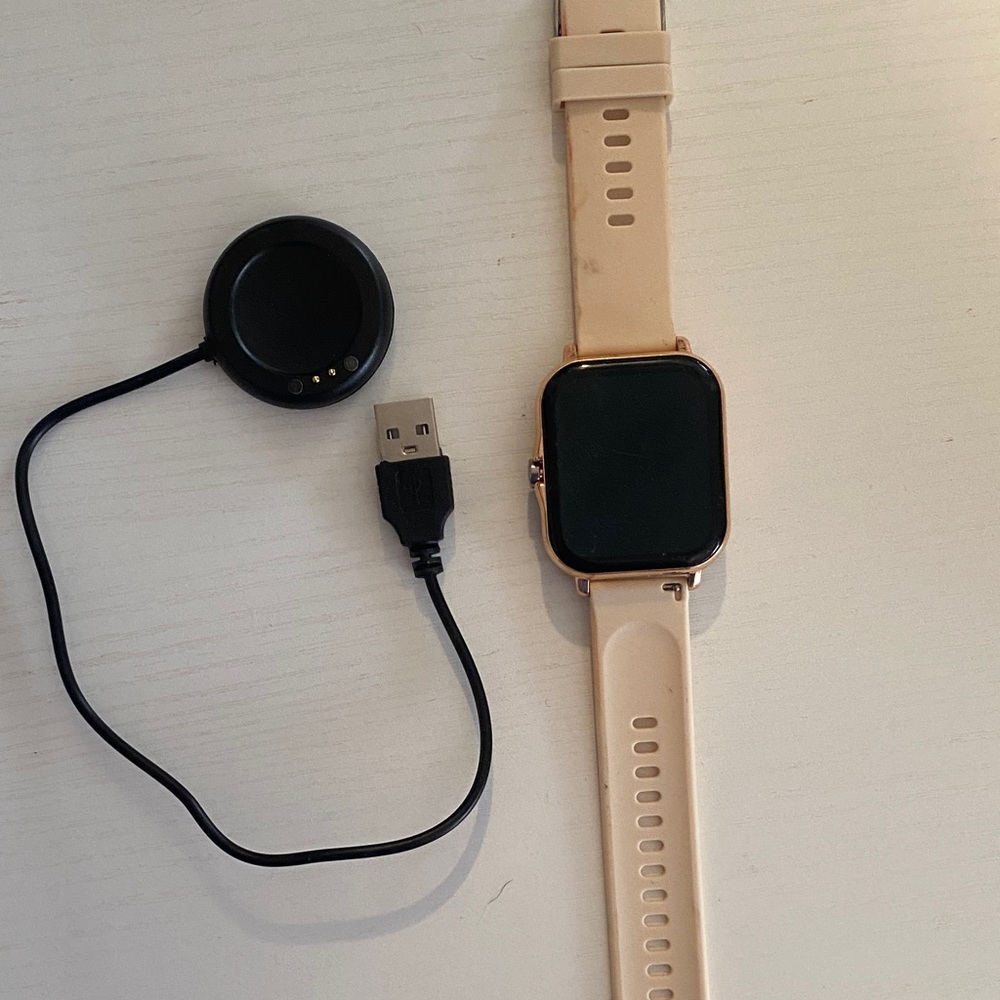 Smartwatch with Cream Strap and Gold Accents